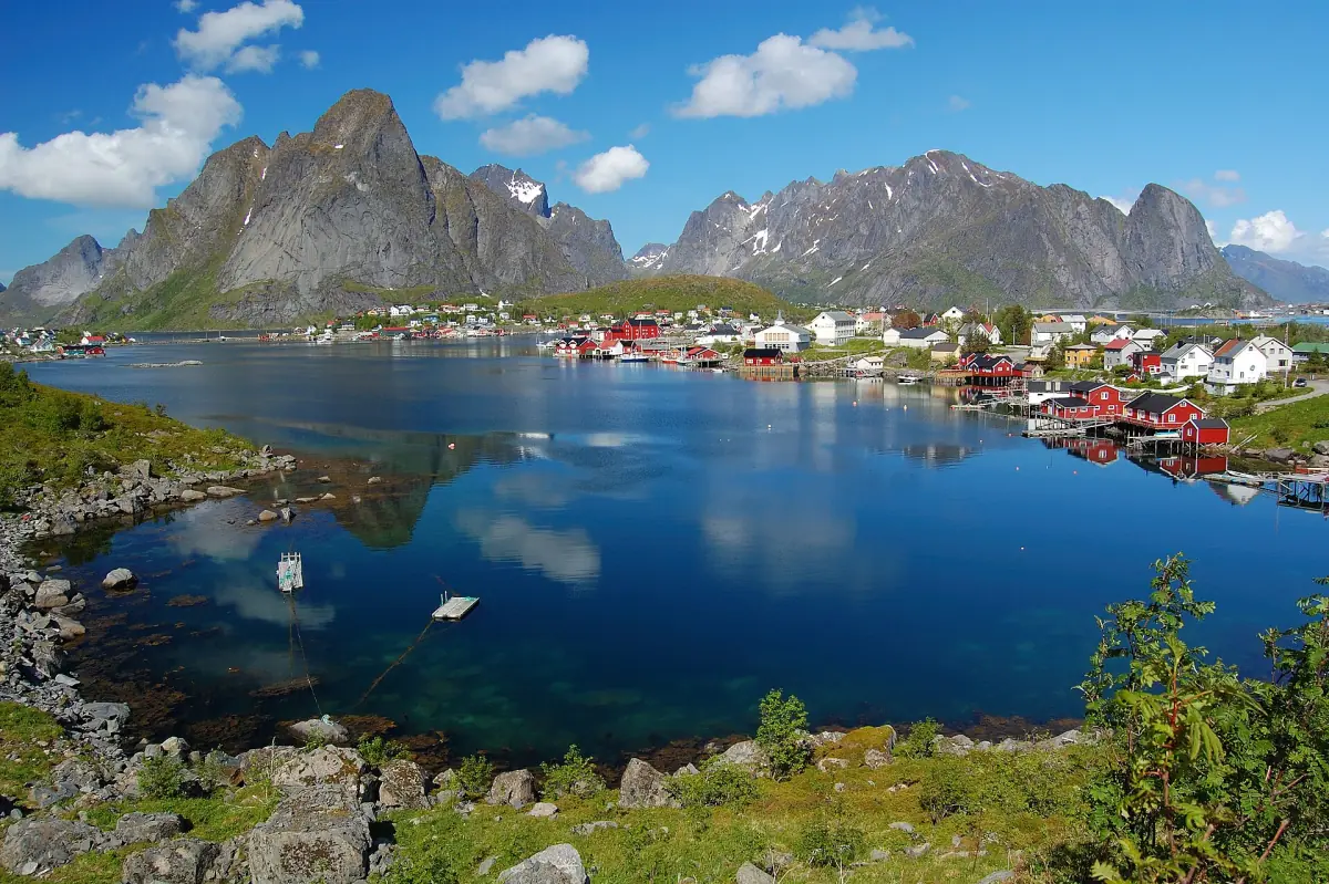 Reine and its fjord below jagged peaks