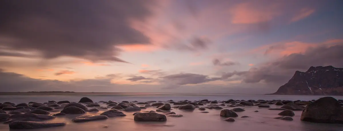The rocky shore at Uttakleiv